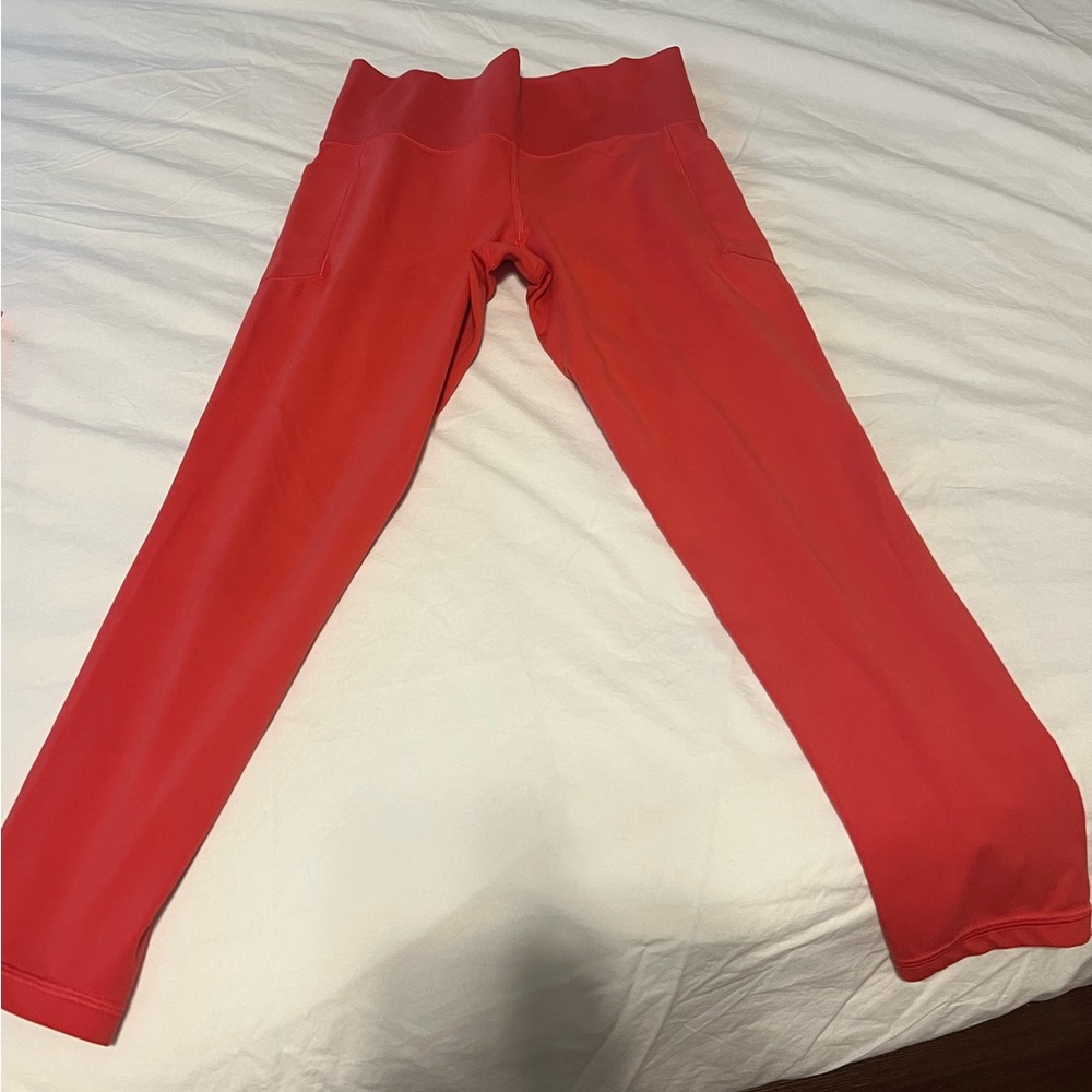Athleta salutation stash 7/8 in amaryllis pink
